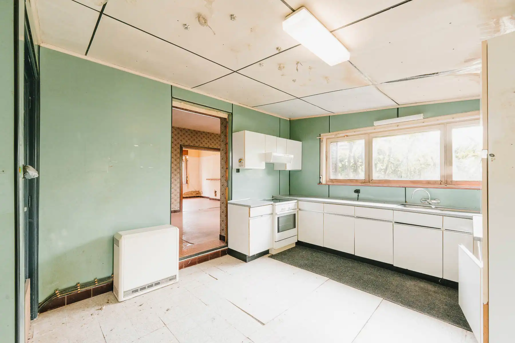 Gezellige, te renoveren open woning in een rustige straat foto 11