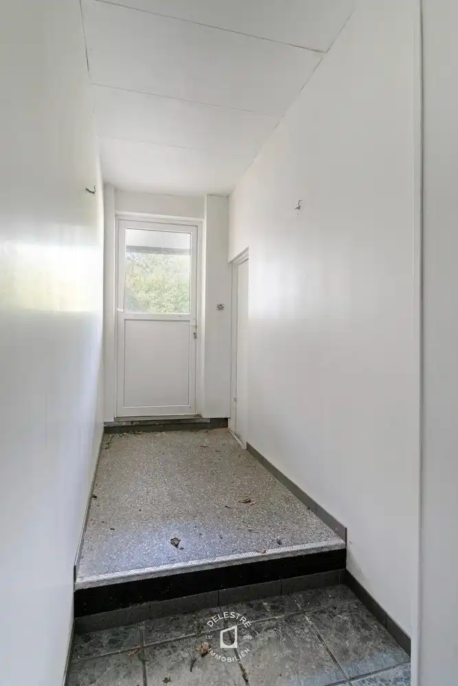 Veelzijdig renovatie- of herbestemmingsproject met zonnige stadstuin in vernieuwde Gentsestraat foto 13