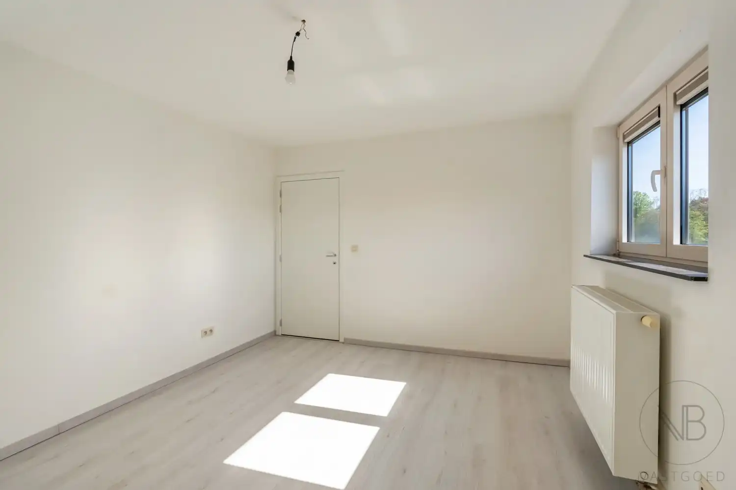 Ruim duplex appartement met 3 slaapkamers en groot terras in hartje Zutendaal foto 14