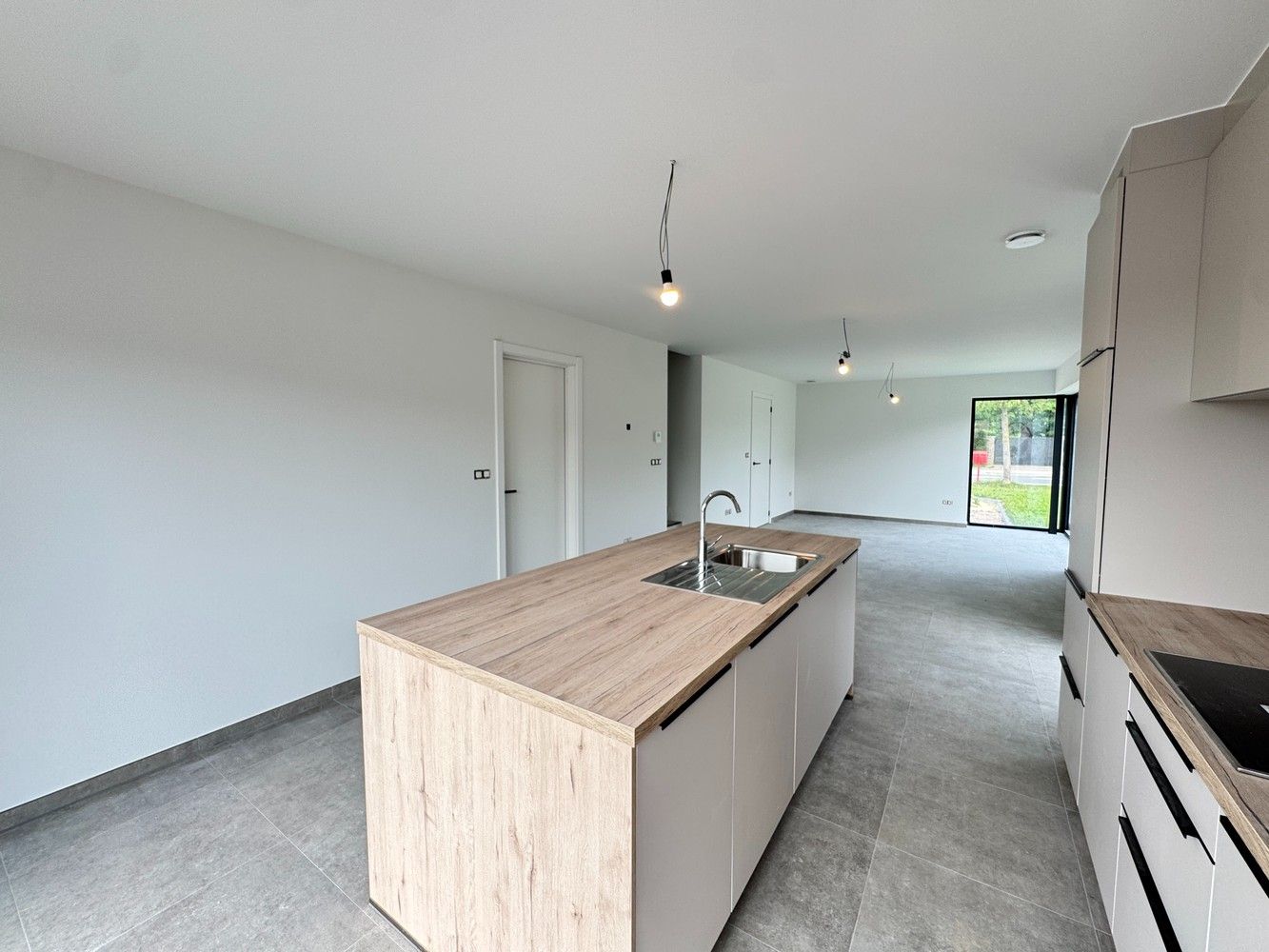 Te huur in Zutendaal - Energiezuinige nieuwbouwwoning met drie slaapkamers foto 3
