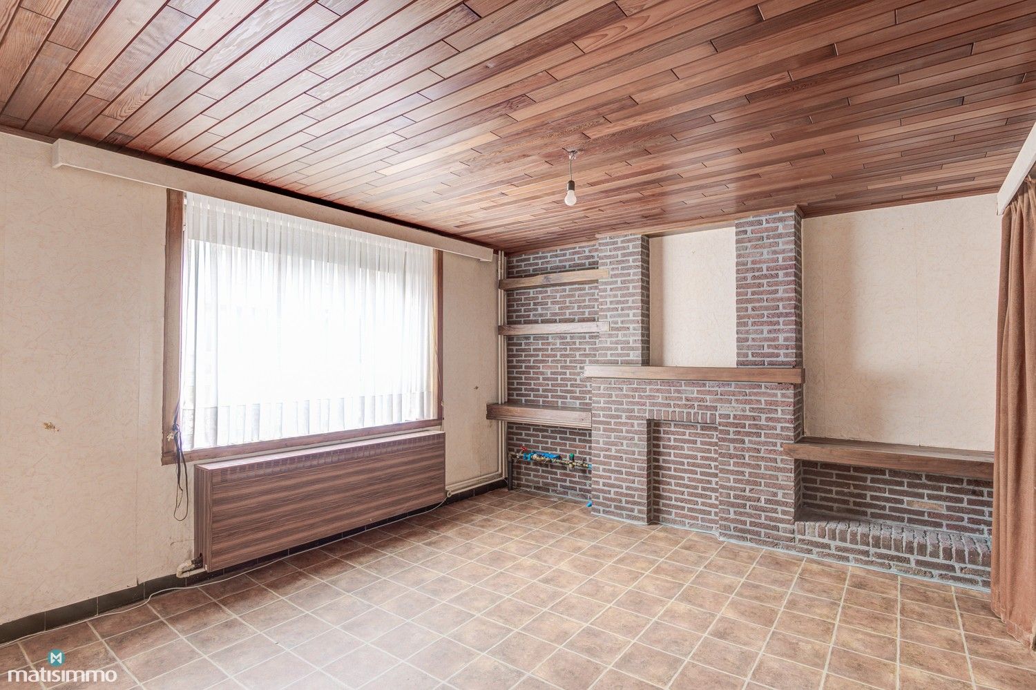 GEZINSWONING MET RUIME TUIN EN DRIE SLAAPKAMERS IN MARTENSLINDE foto 4