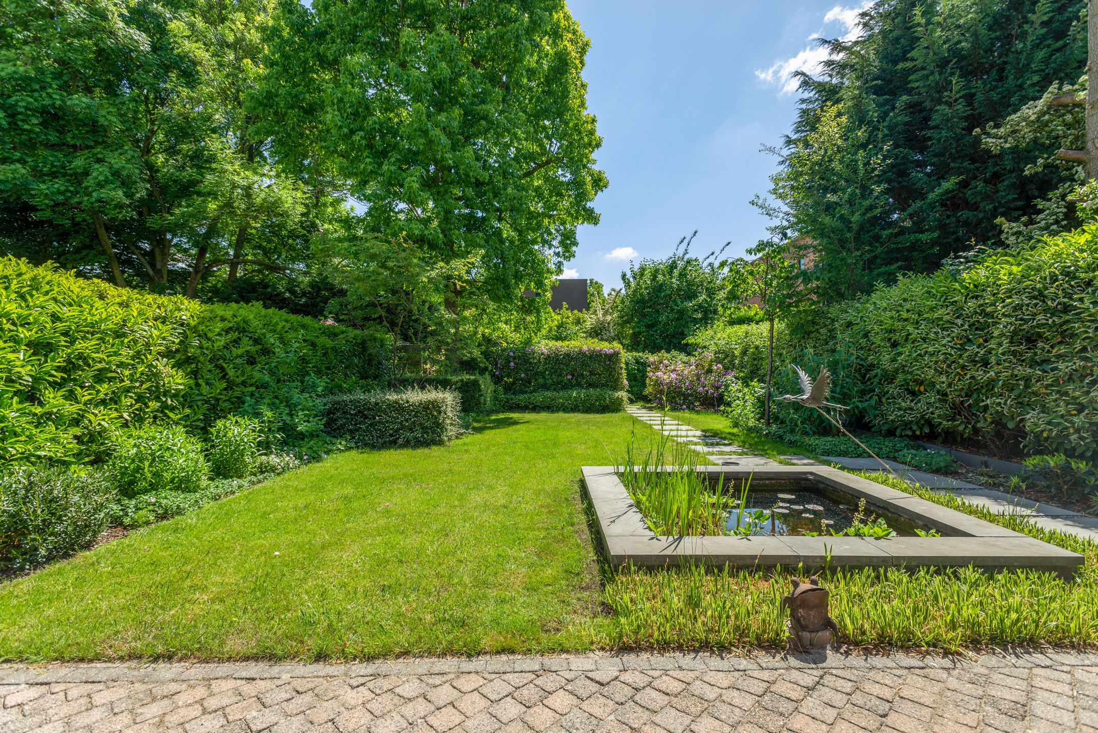 Ruime halfopen woning met schitterende tuin! foto 4