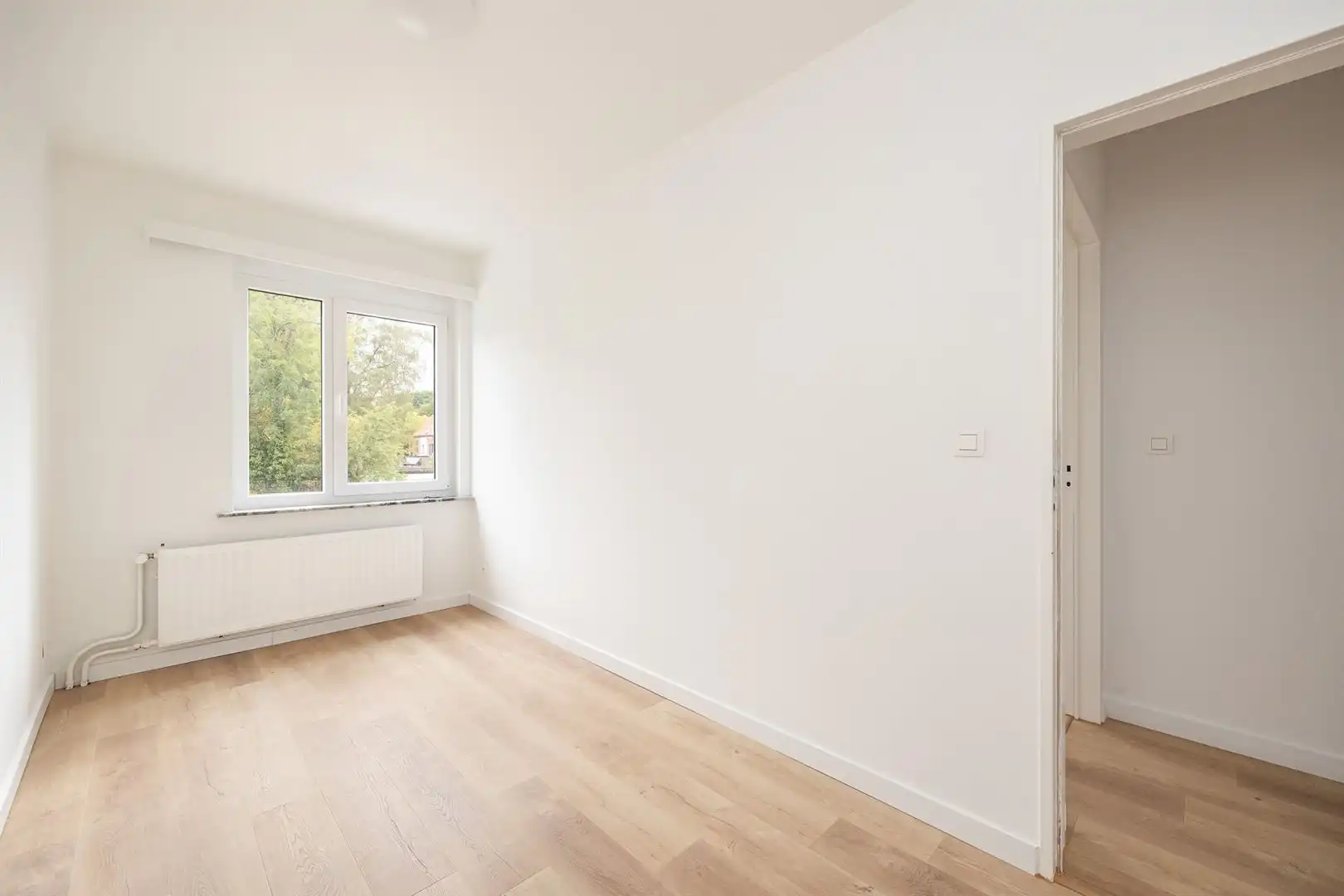 Gerenoveerd appartement met parking en tuin aan het Veltwijckpark. foto 12