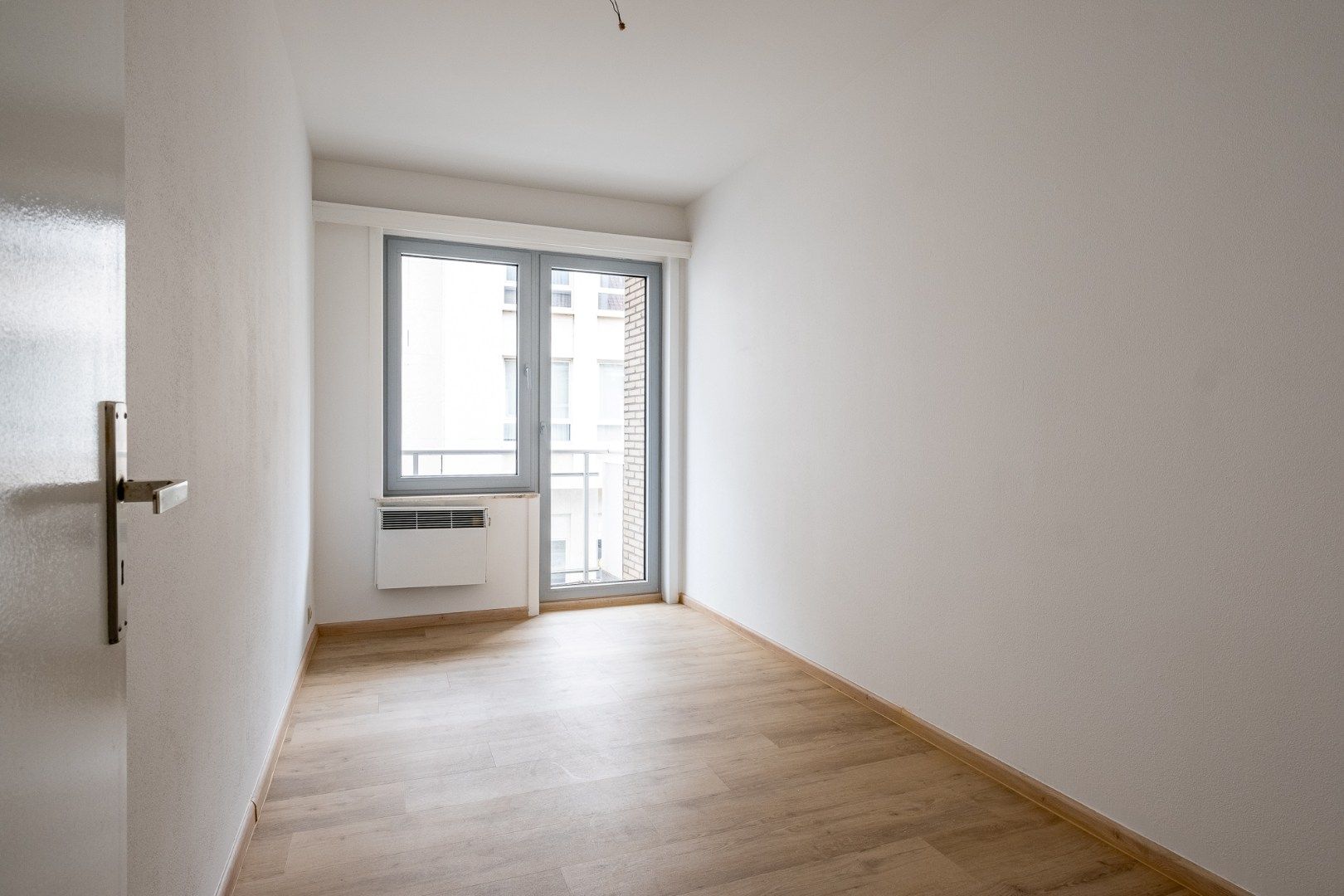 Ruim 3-slaapkamer appartement (95 m²) op de 1ste verdieping met lift aan centrum Beveren!  foto 13