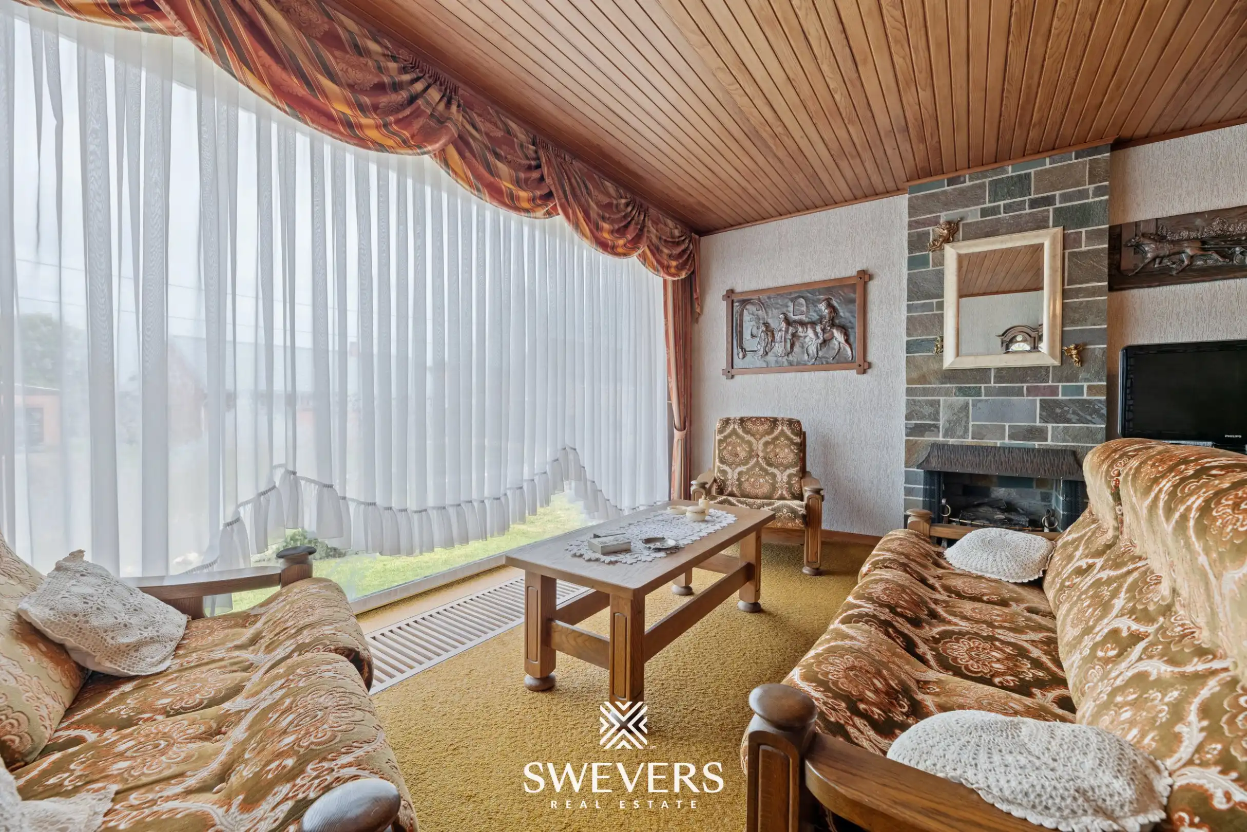 Gelijkvloerse woning op ruim perceel van 9a 25ca  foto 3