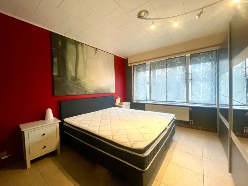 GELIJKVLOERS APPARTEMENT MET TWEE SLAAPKAMERS, TUIN EN GARAGE TE HUUR foto 9