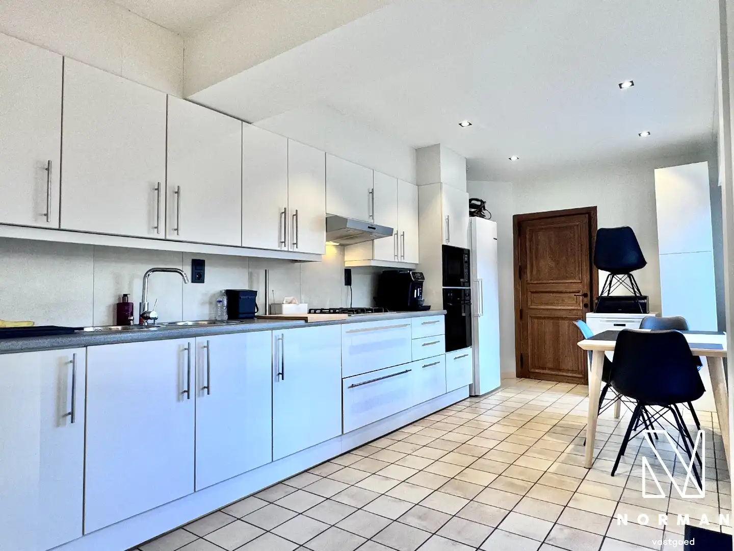 Instapklare woning te koop in rustige woonwijk te Bavikhove met tuin, garage en uitweg! foto 8