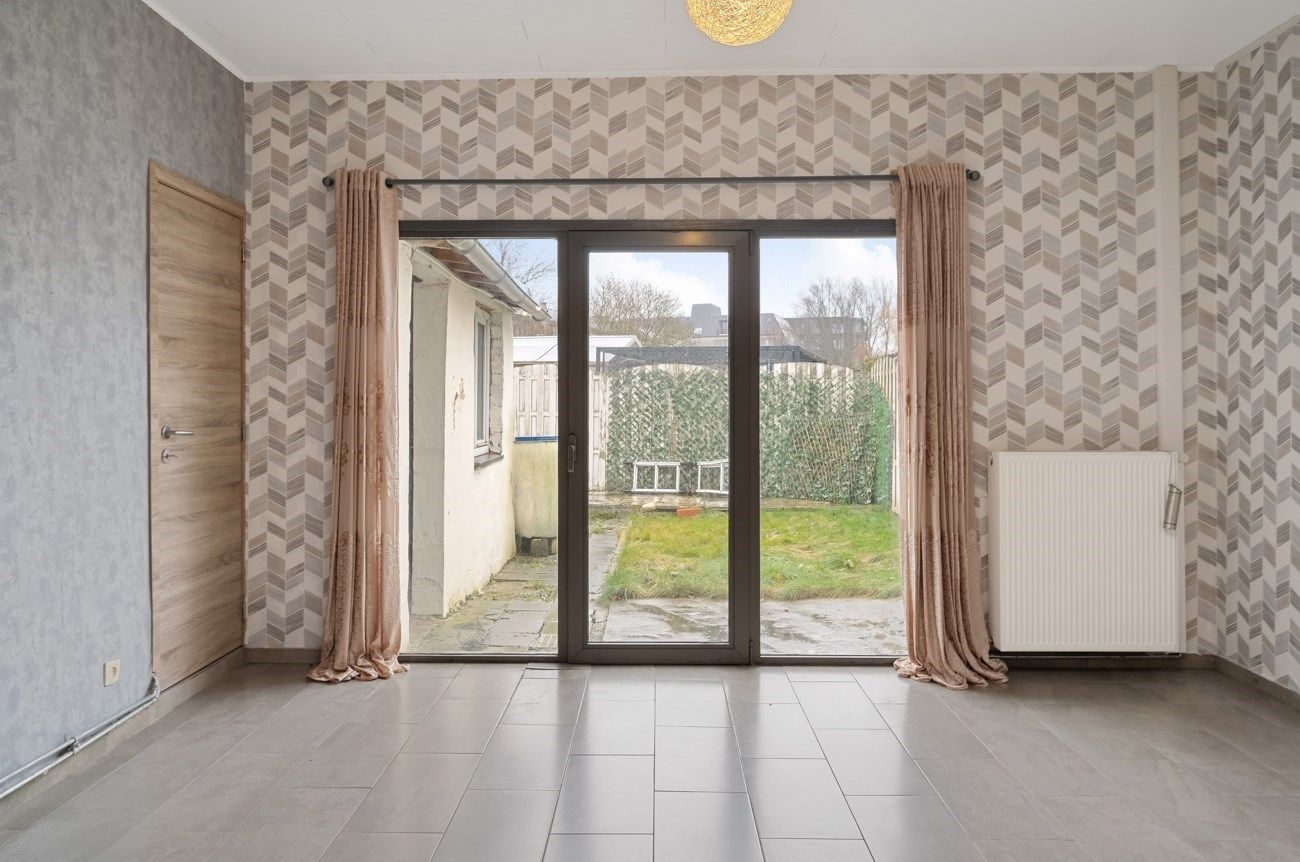 Ruime woning met tuintje en terras. foto 8