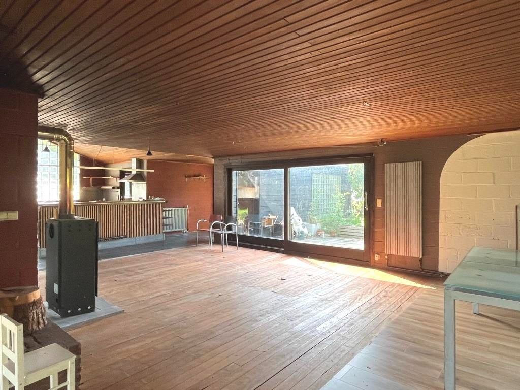 Volledig te verbouwen/slopen woning met 3 slaapkamers, inpandige garage, tuin en garagebox op een perceel van 1.154m² foto 13