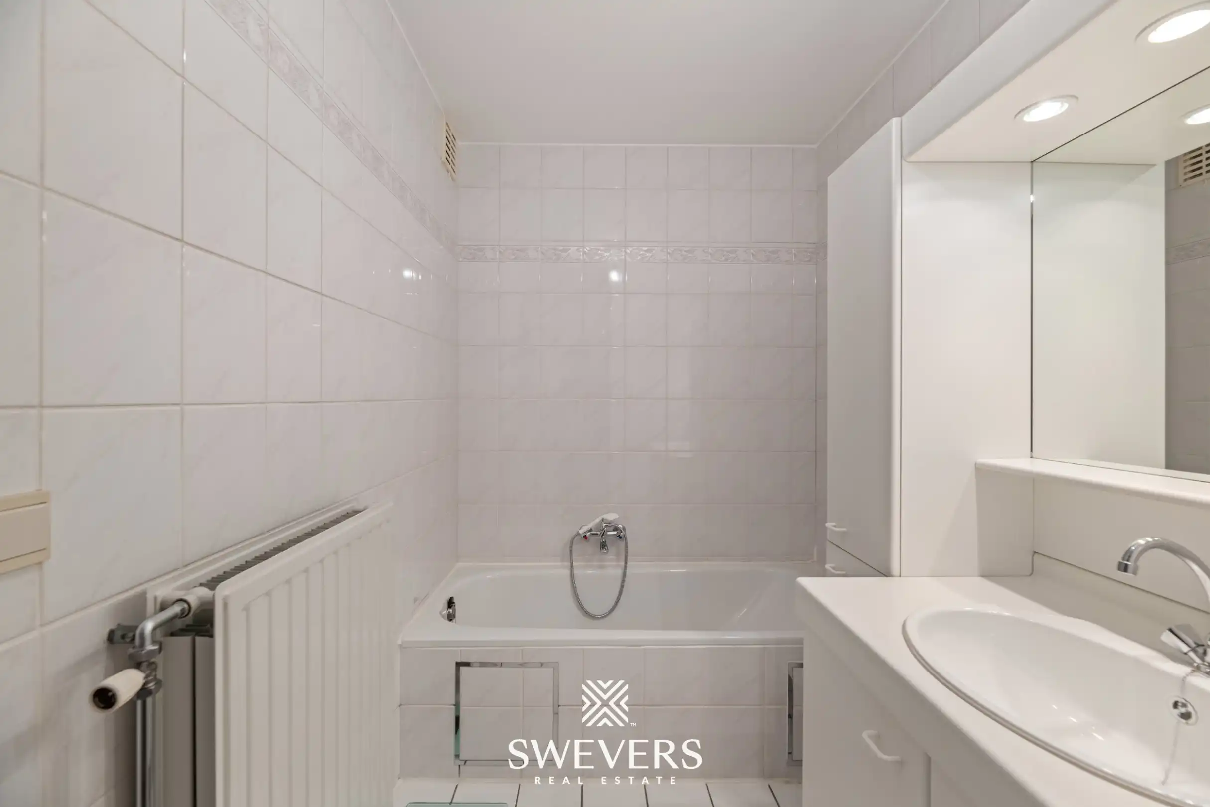 Ruim 2-slaapkamerappartement met groot terras en privéparking in centrum Beringen foto 15