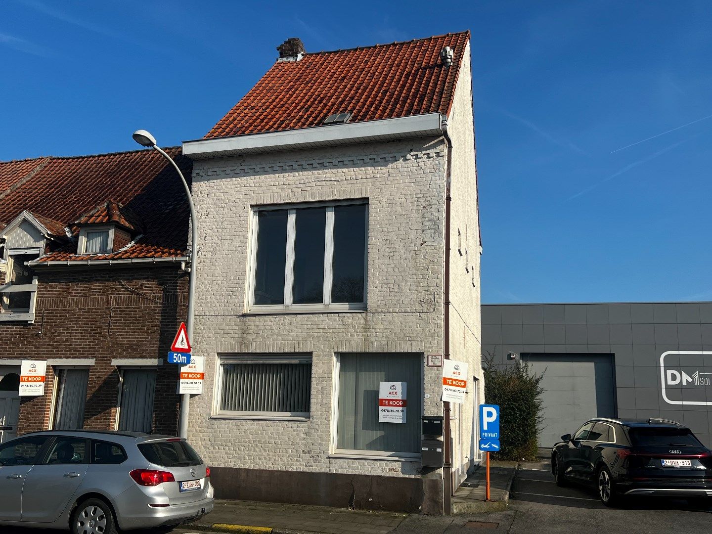 Hoofdfoto van de publicatie: Te renoveren handelshuis  met 2 parkeerplaatsen te koop te Heule.