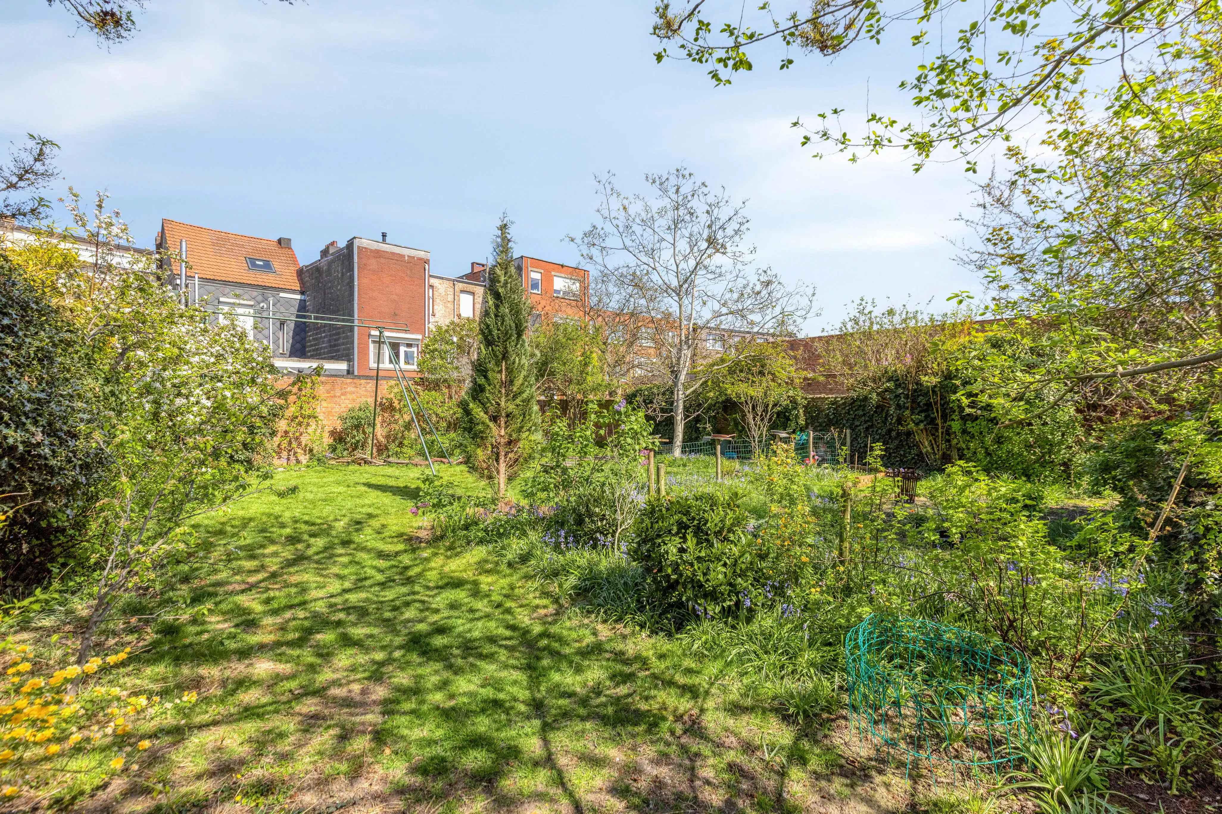 Charmant huis met ruime en zonnige tuin te koop in Merksem! foto 30