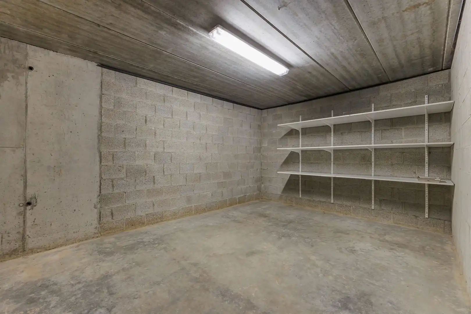 Gelijkvloers appartement met 2 slaapkamers en garage! foto 20