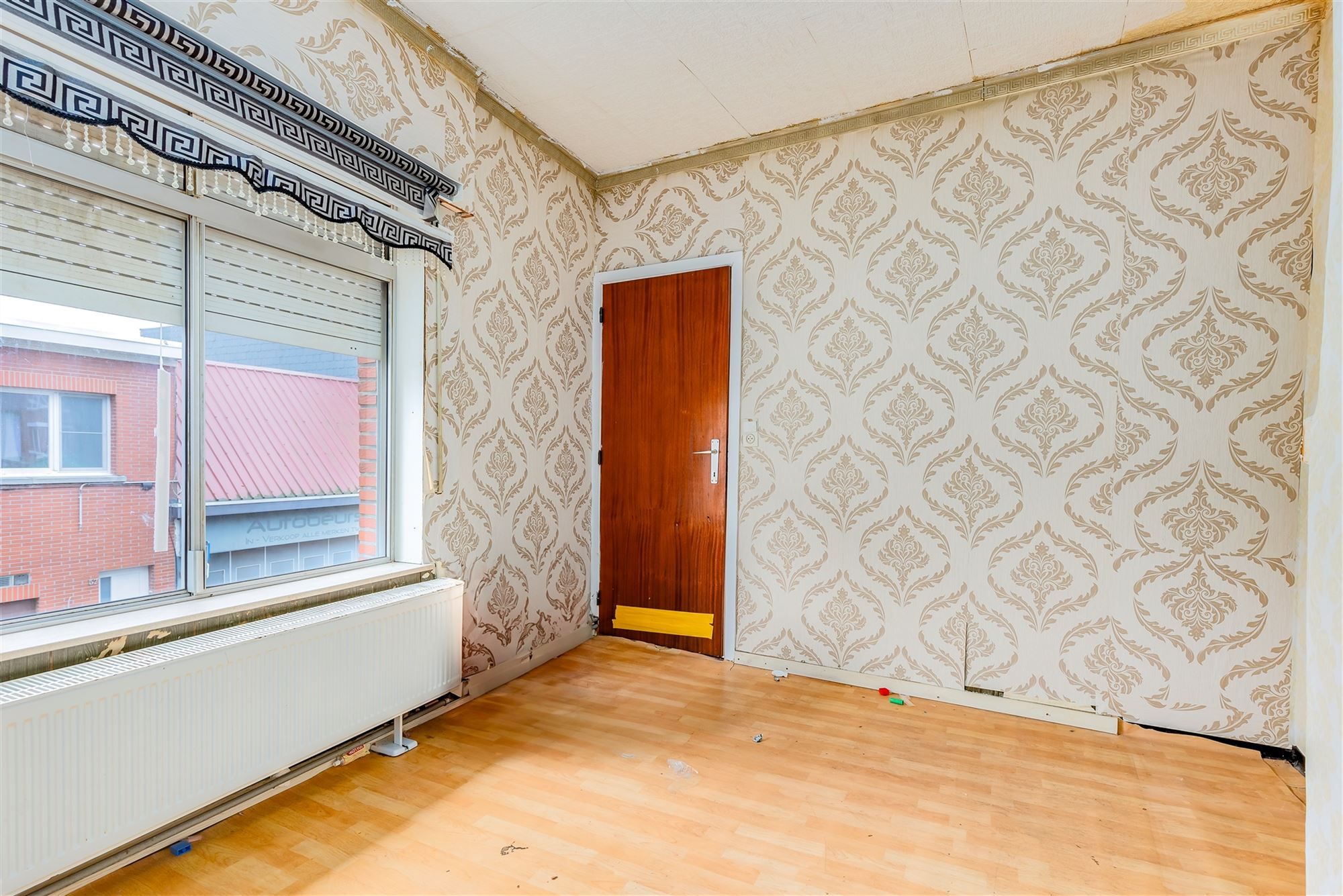 Te renoveren woning 2 slpk met garage foto 13