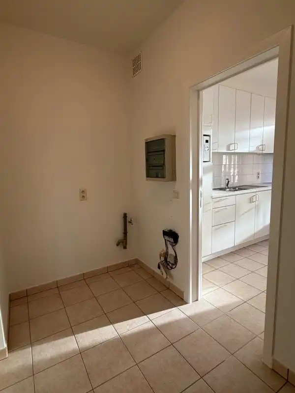 Instapklaar triplexappartement met 3 slaapkamers, 2 badkamers, garage + P in hartje Hoogstraten. foto 10