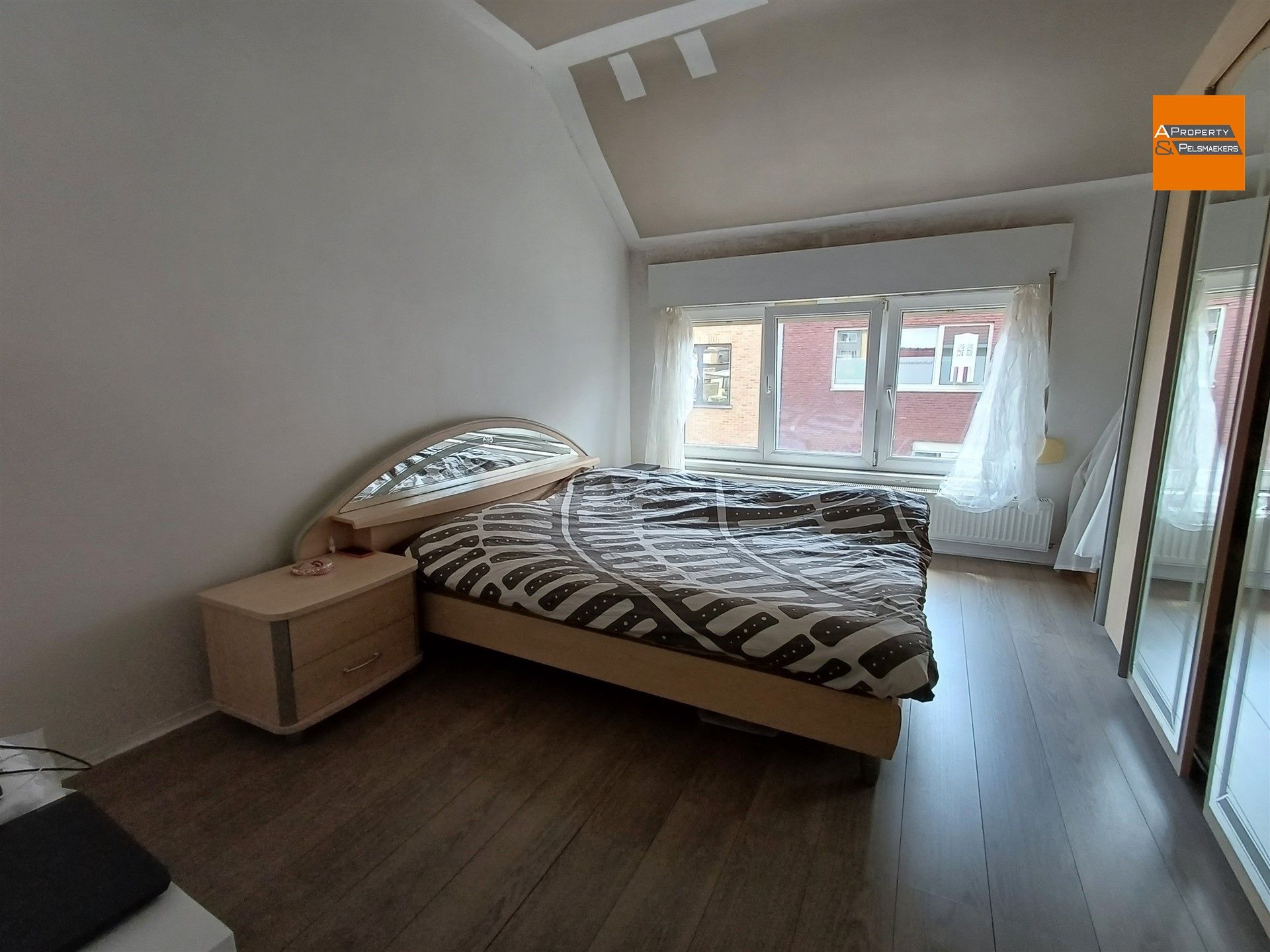 Huis met 2 slaapkamers en mooie tuin in het centrum  foto 10