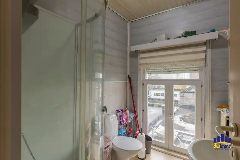 Opbrengsteigendom met woonst te koop op toplocatie langs de Brusselsesteenweg Gent foto 14