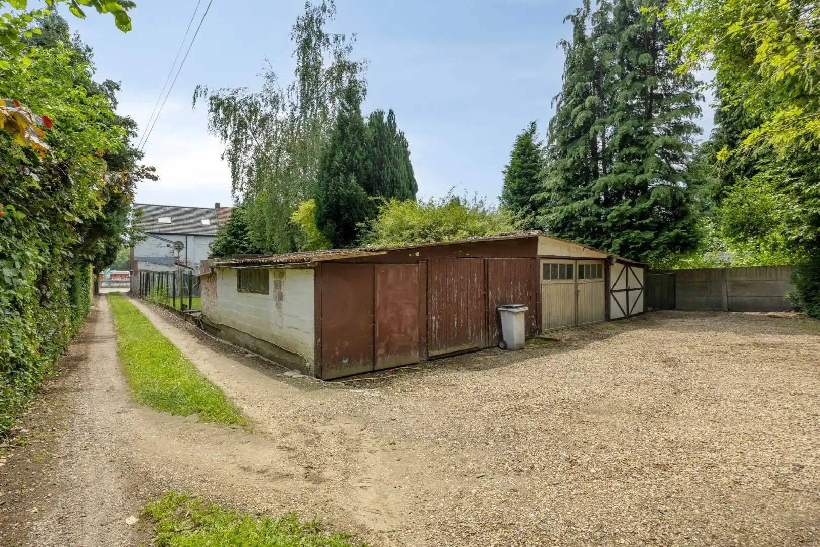 Ruime te renoveren woning met 3 slaapkamers in Lubbeek met doorgang langs het perceel van de buren. EPC: 736 KWH/m² foto 36