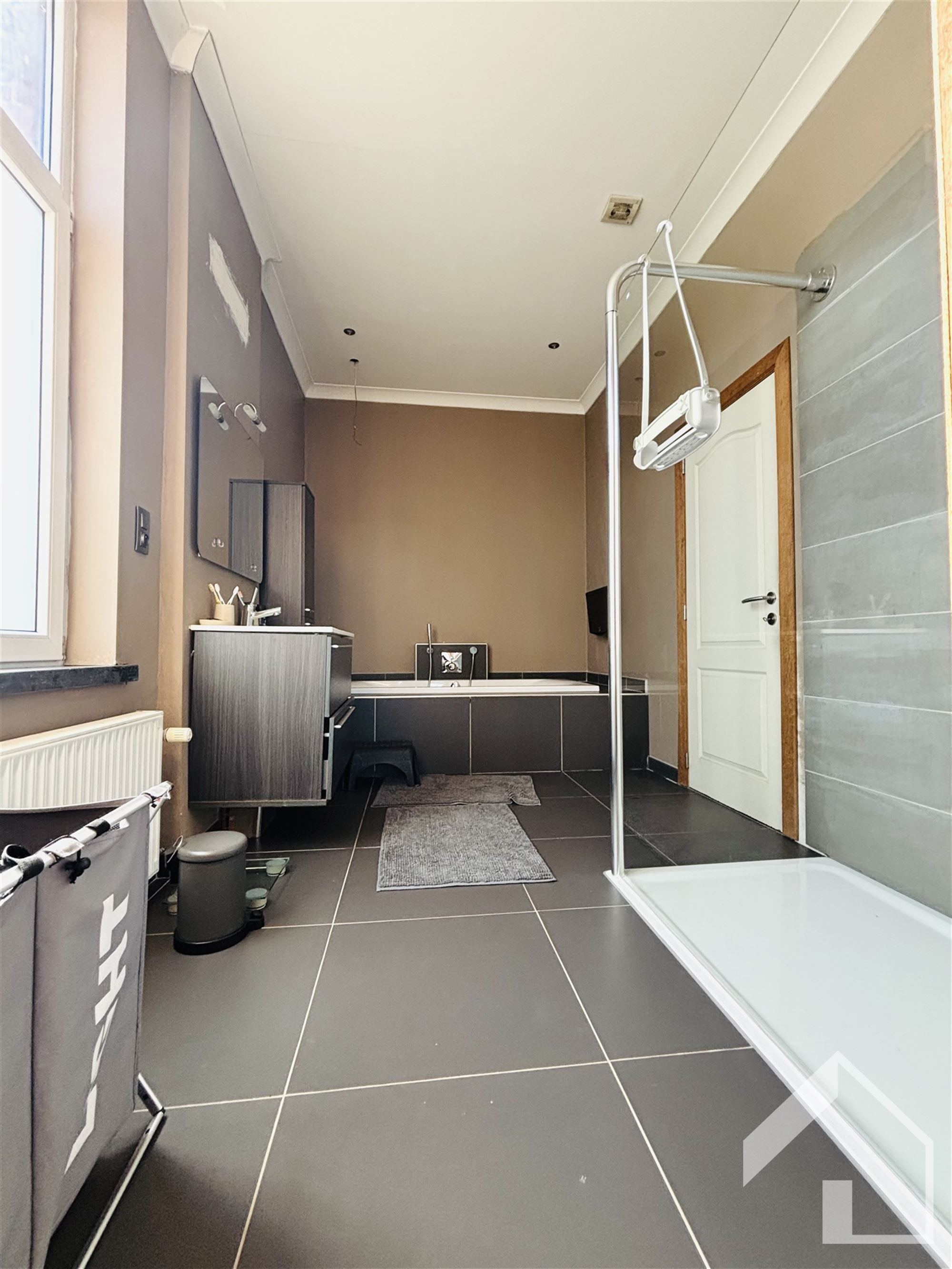 Gedeeltelijk gerenoveerde woning in het centrum van Nijlen foto 8