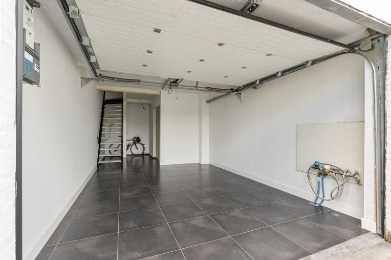 Zeer ruim en stijlvol penthouse met tuin en garage foto 23