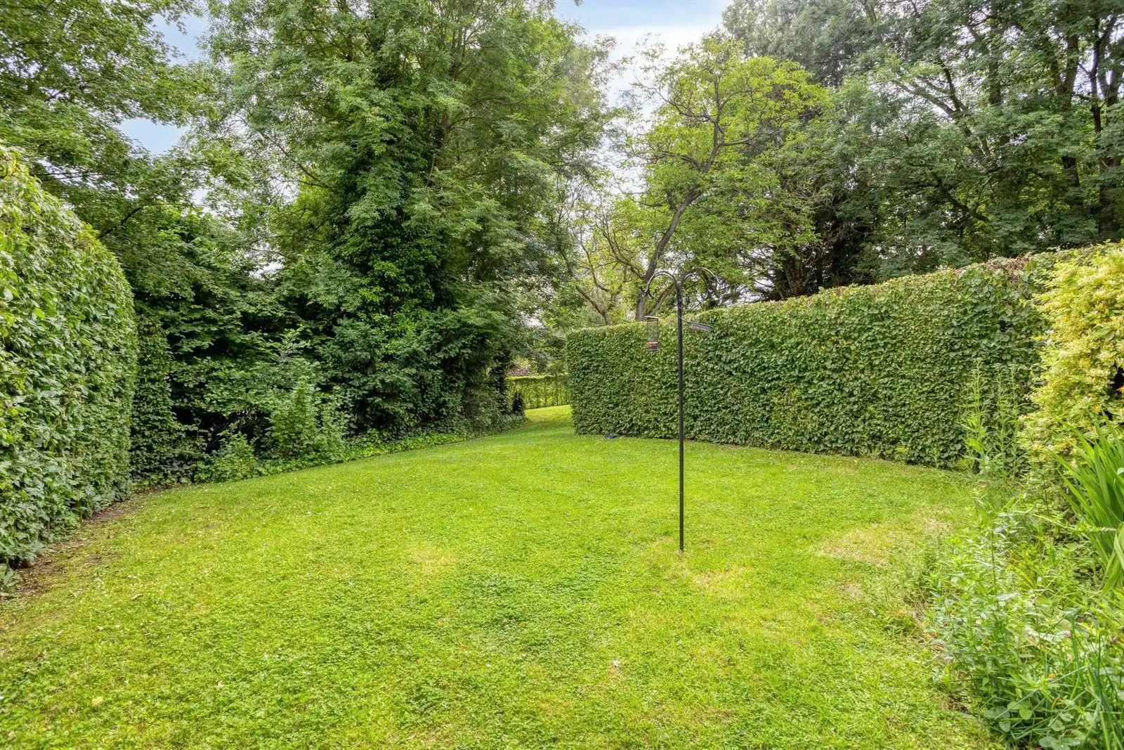 Gelijkvloers appartement met 2 slaapkamers en tuin, kelder & staanplaats foto 6
