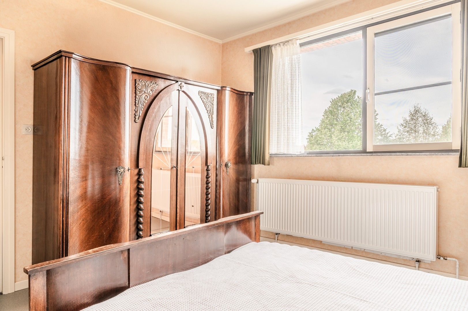 Praktische bel-etagewoning met 3 slaapkamers en tuin. foto 14