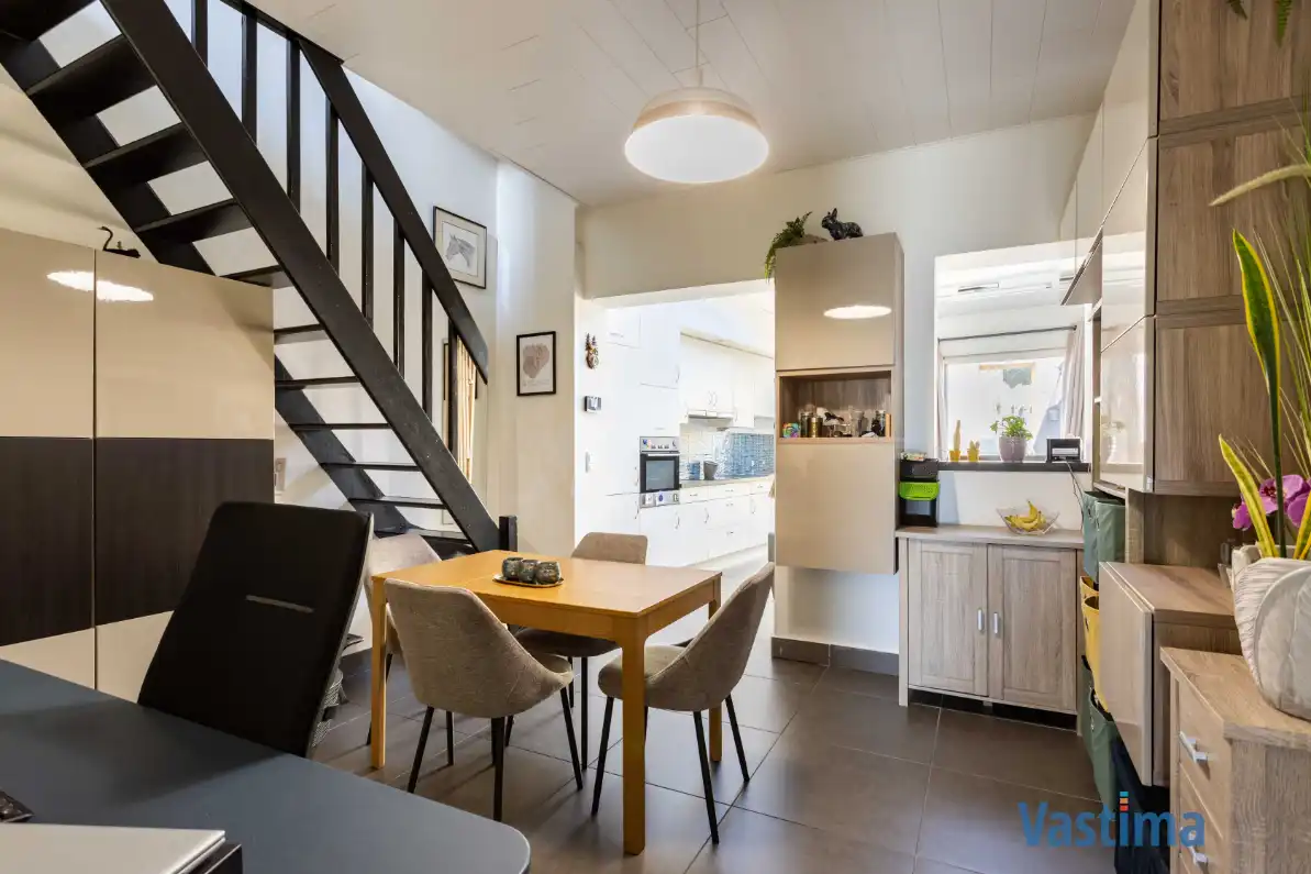 Energiezuinige en instapklare starterswoning met 2 slaapkamers in hartje Erembodegem foto 3