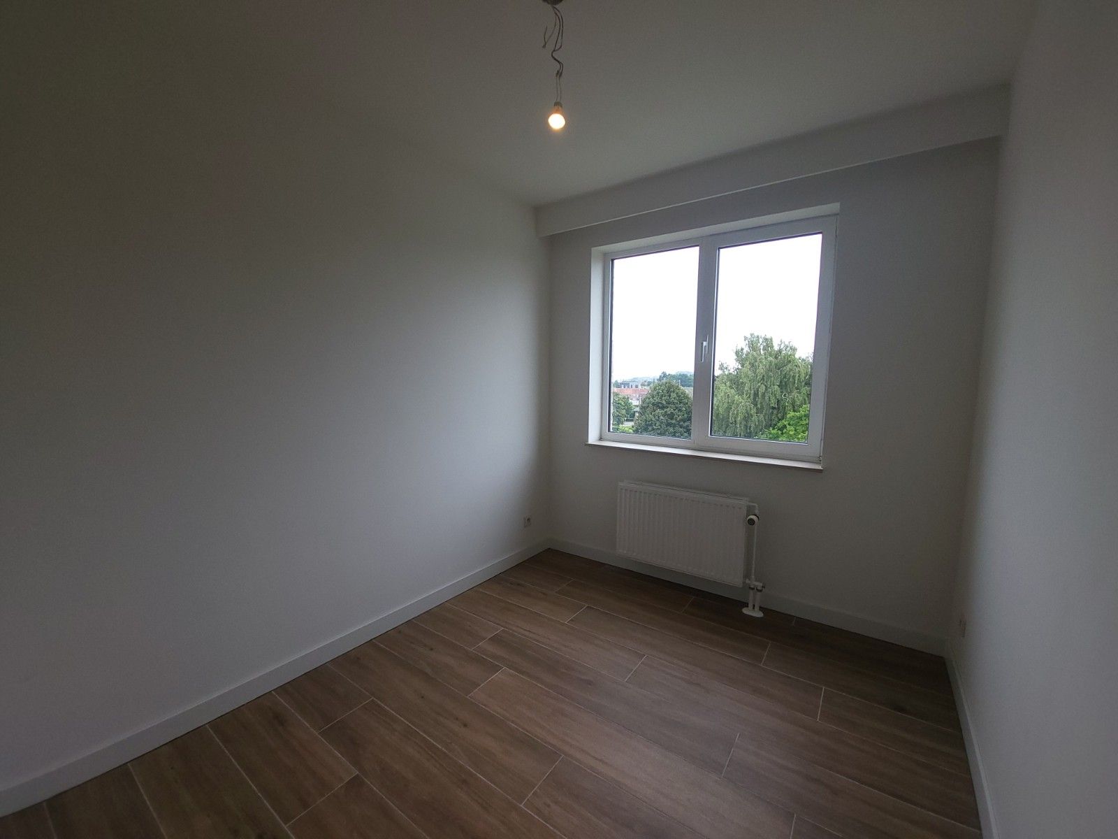 Centraal gelegen 2-slaapkamerappartement te Deinze foto 11