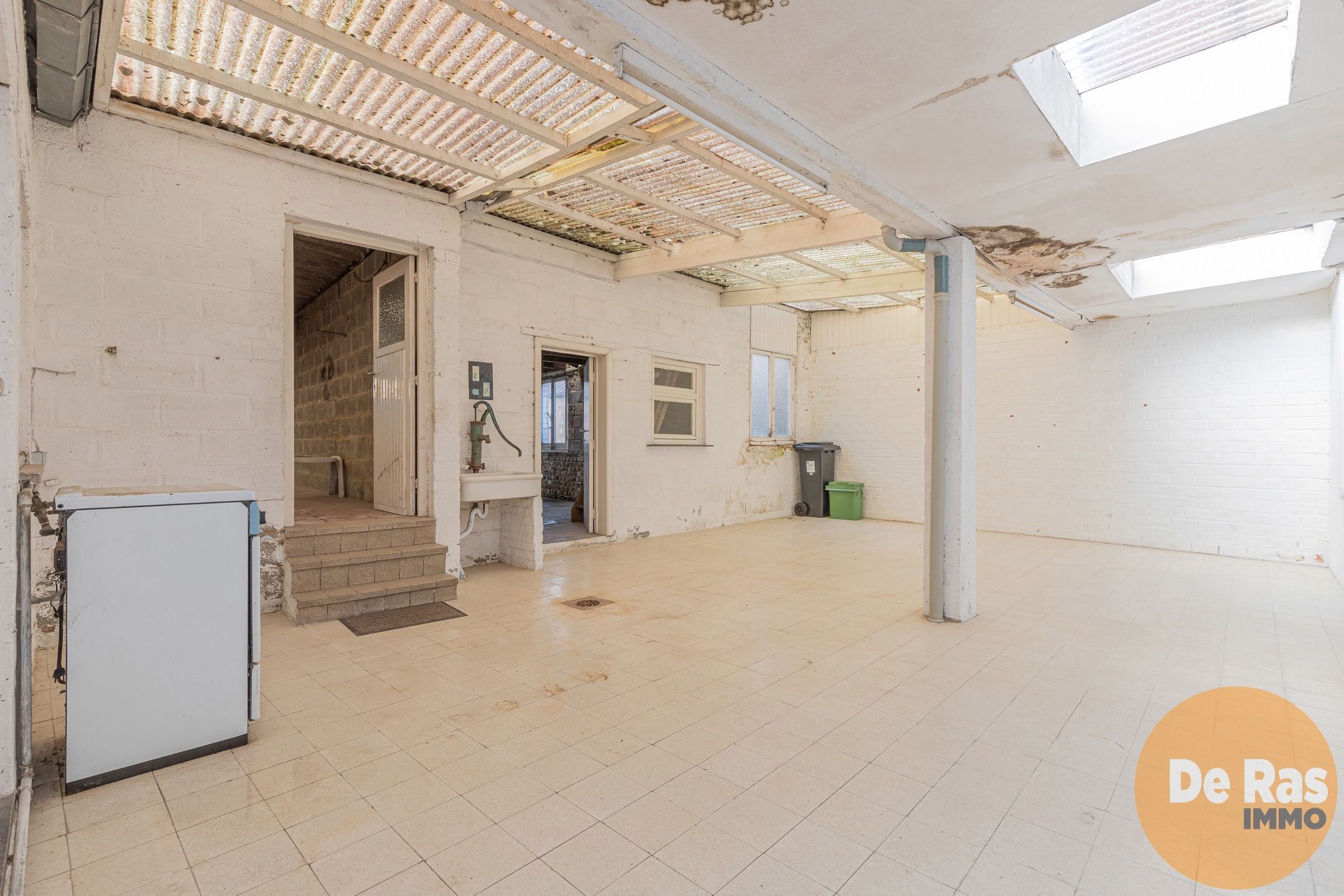 DENDERHOUTEM- Ruime 3-gevelwoning met 4 slpk, tuin en garage foto 14