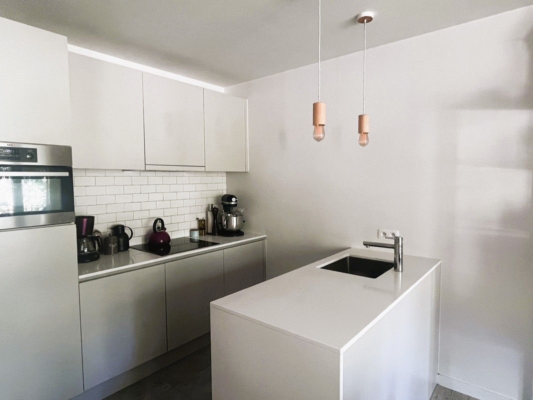 Appartement met terrassen en garage te huur foto 3