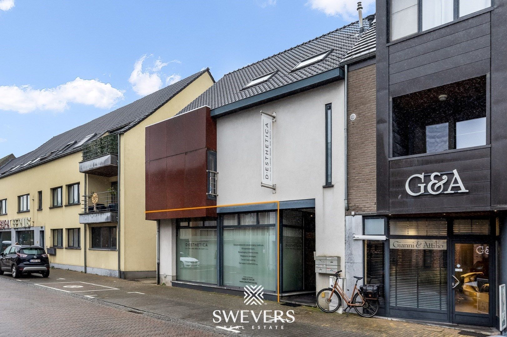 Trendy en instapklaar handelspand met optie tot magazijn op TOPlocatie in centrum Koersel foto 1