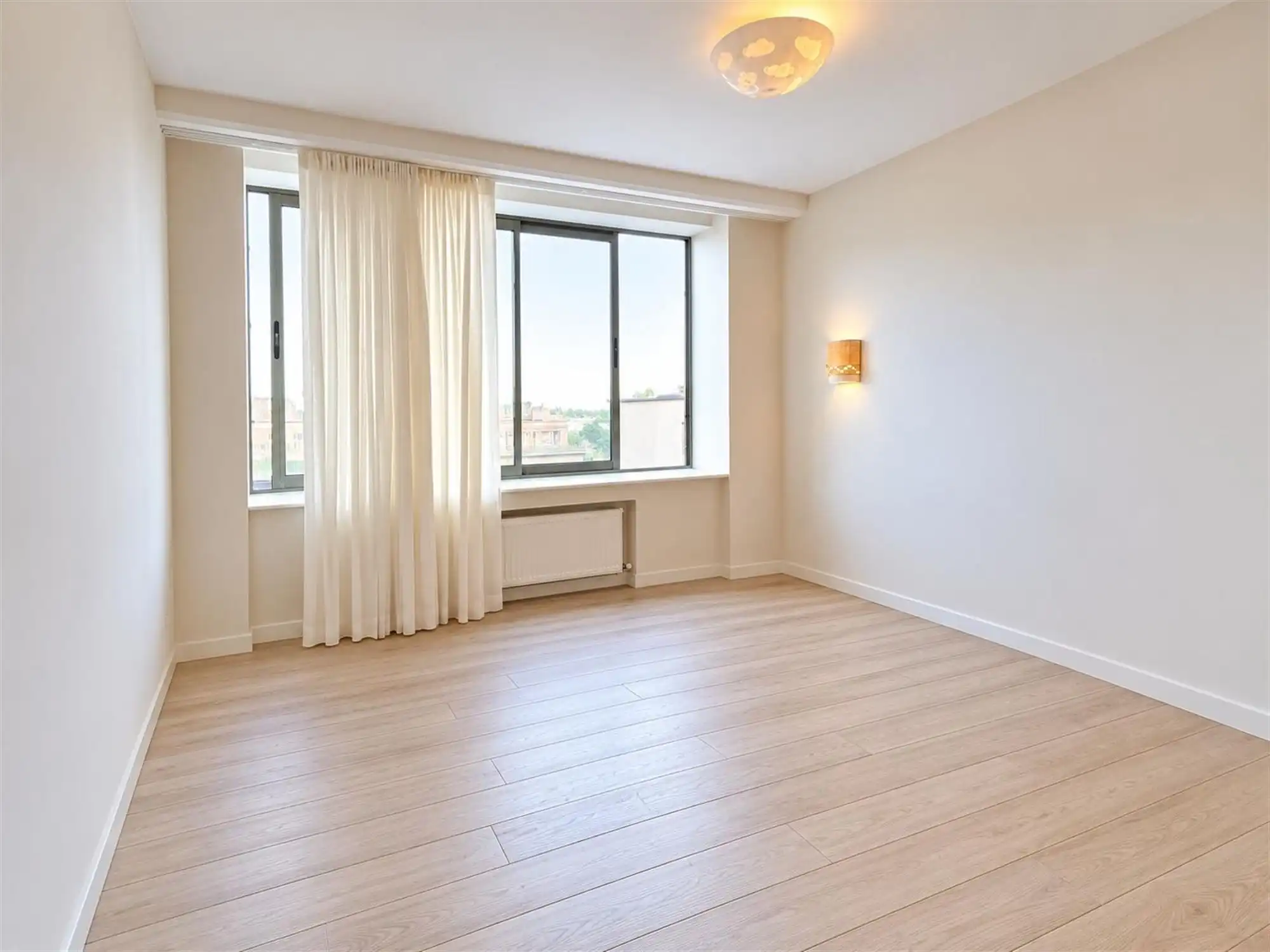 Ruim appartement met twee slaapkamers te Mechelsesteenweg foto 11