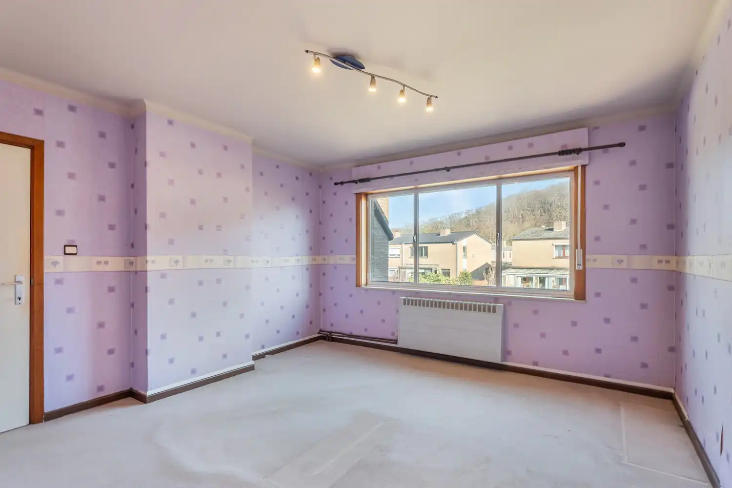 Goed gelegen en half open woning met 3 ruime slaapkamers, een extra leefruimte, een garage en een tuin te Kessel-Lo! foto 11