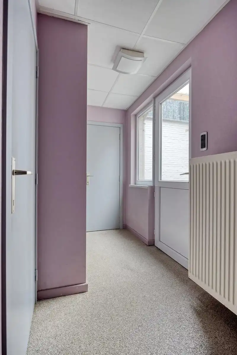 UNIEK HANDELSPAND VAN 110M² MET DUPLEXAPPARTEMENT VAN 146 M² MET 3 SLPK IN LANAKEN CENTRUM foto 11