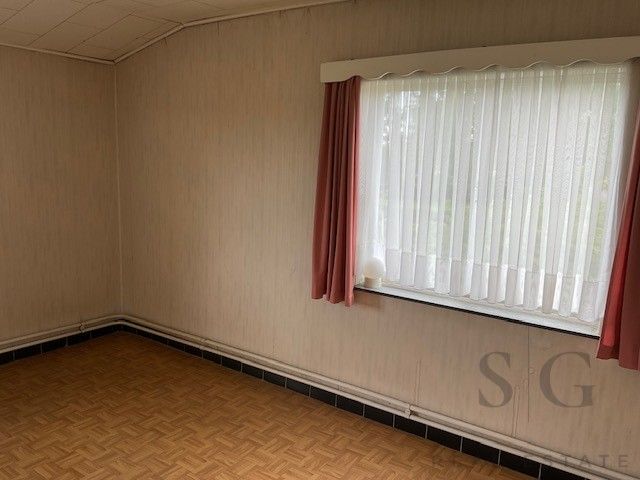 Te renoveren vrijstaande woning op ruim perceel tussen Bocholt en Bree – rust en potentieel op meer dan 32 are foto 18