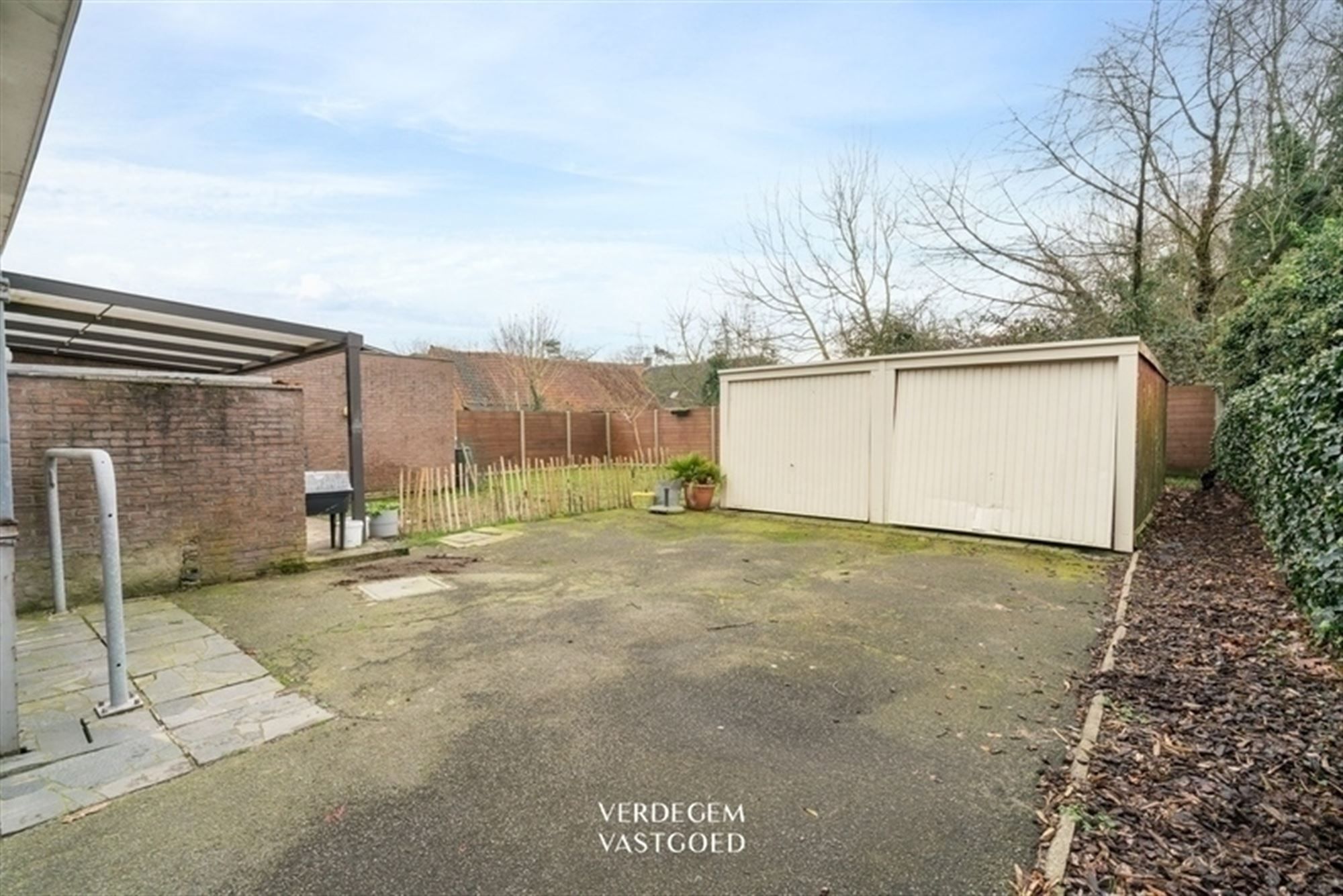 Wonen en werken op een unieke locatie: handelsgelijkvloers met appartement en tuin foto 25