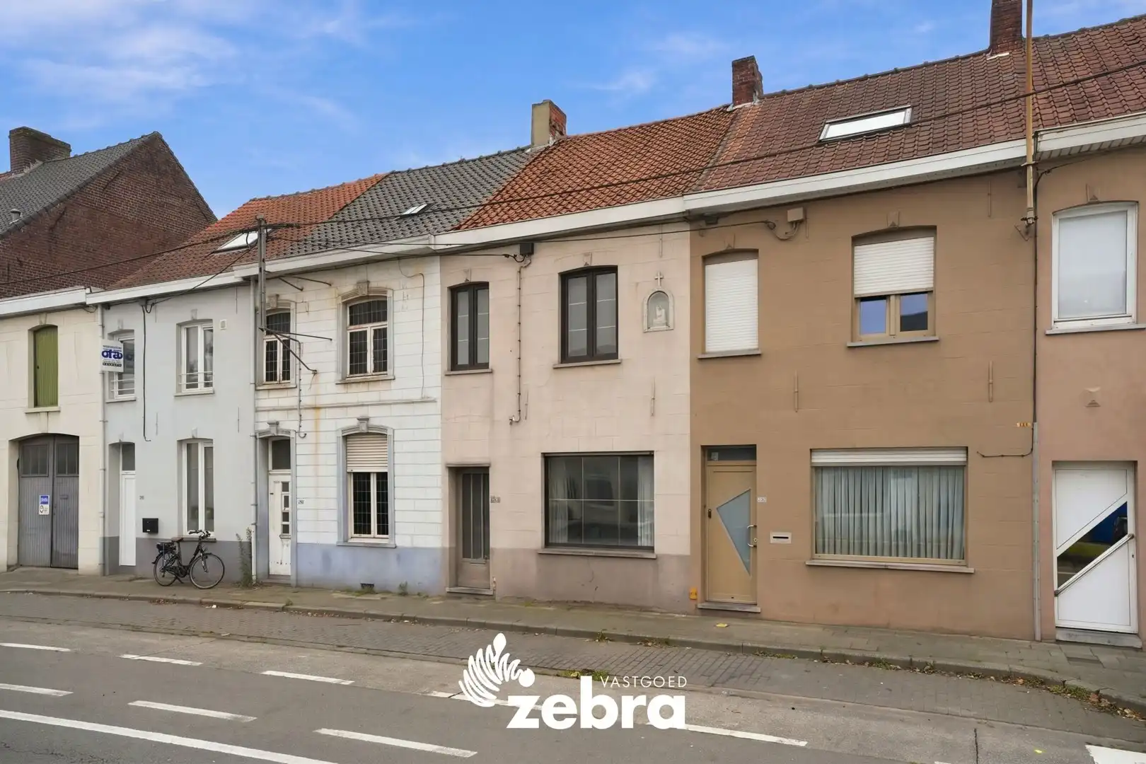 Te renoveren woning met uitweg te Roeselare! foto 15