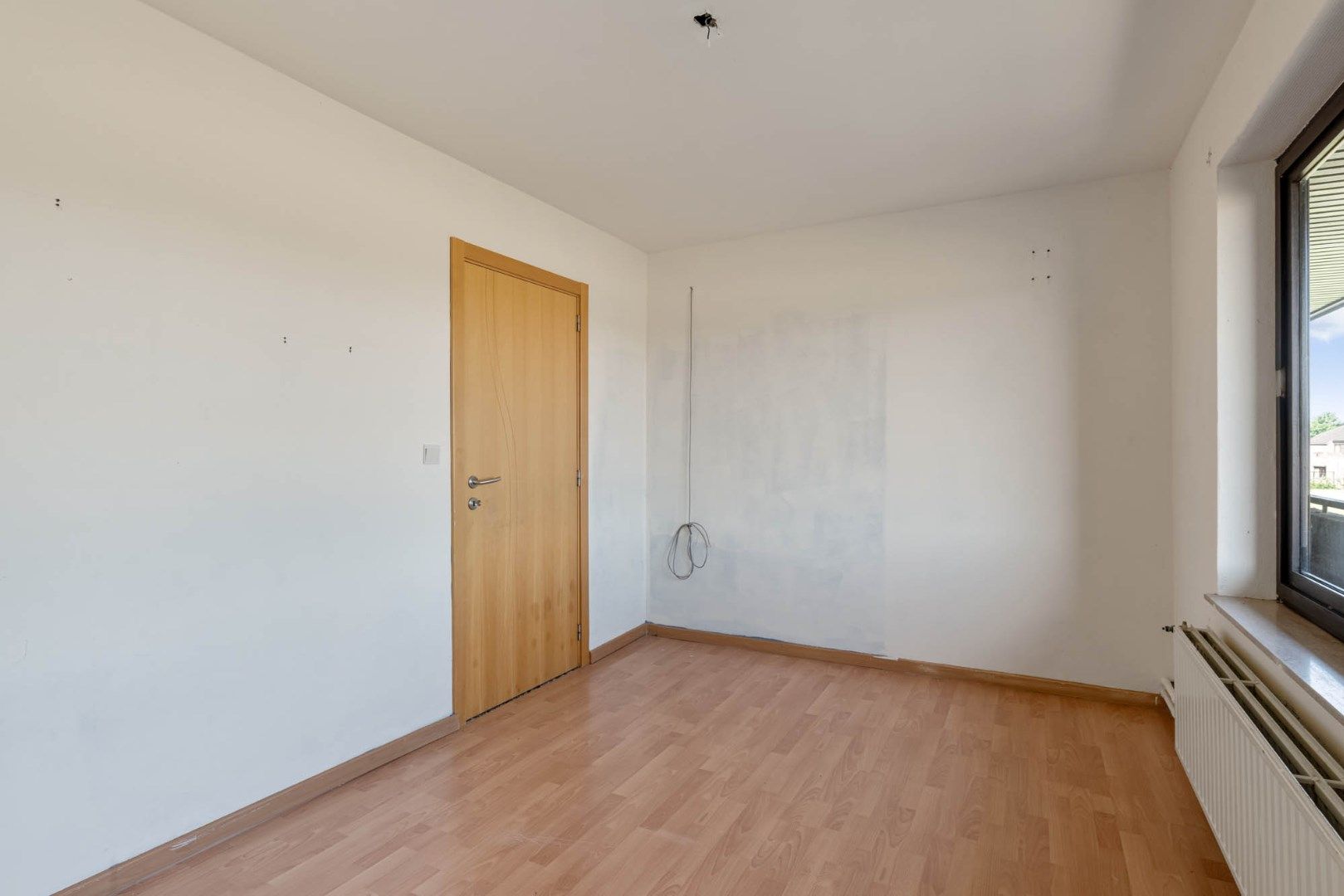 Multifunctioneel gebouw bestaande uit een woning, een winkel en een magazijn/werkplaats gelegen op een rustige locatie te Voorshoven! foto 13
