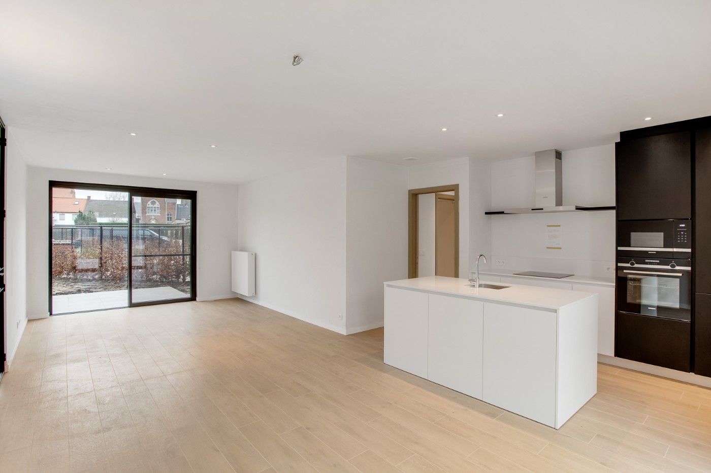 Prachtig, nieuw 2-slpk. appt met tuin en ondergrondse staanplaats foto 3