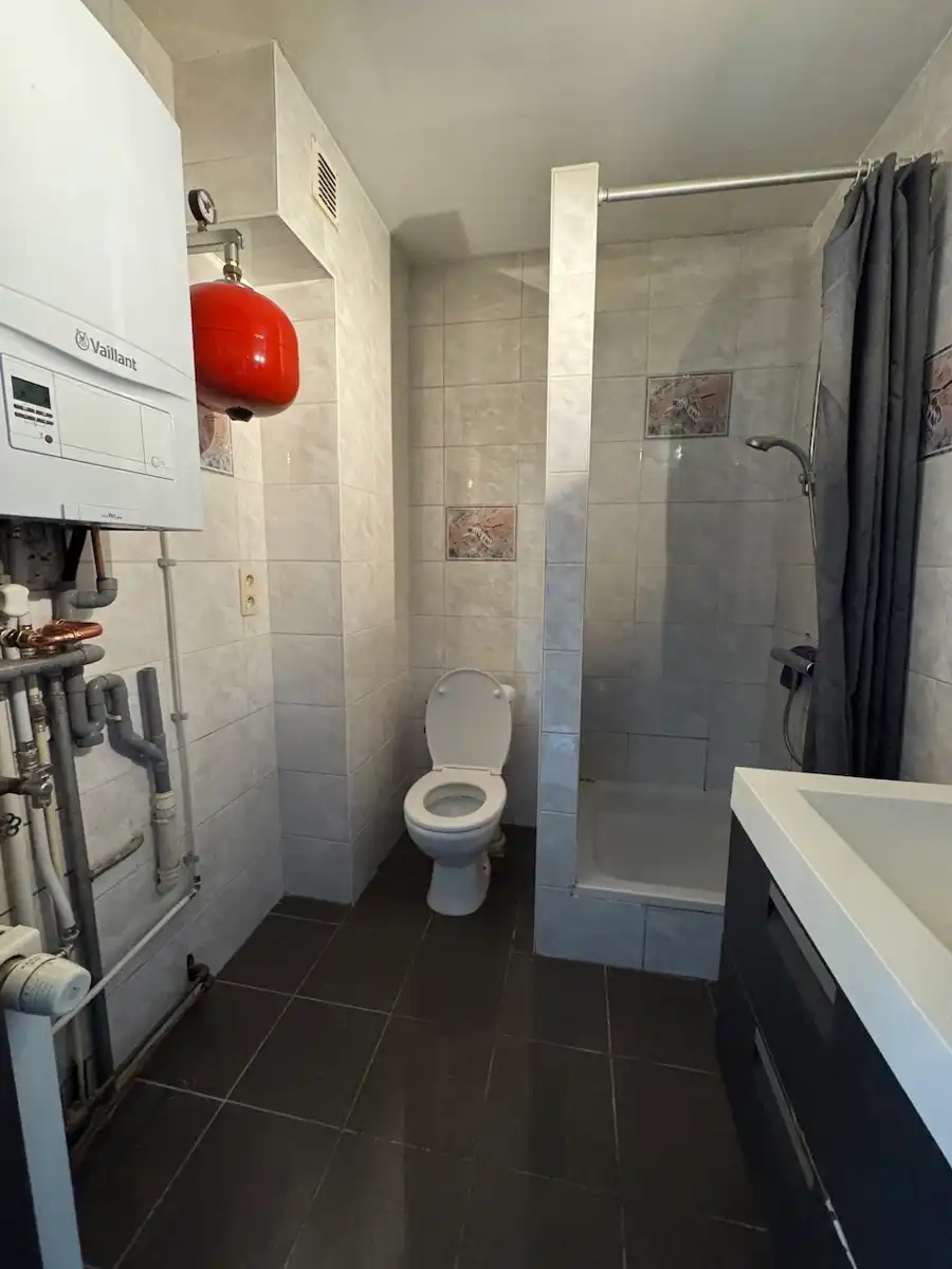 Opbrengsteigendom: 5 appartementen en 48 garages te Aalst! foto 22