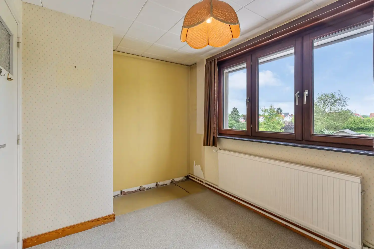 Goed gelegen woning met 4 slaapkamers, een garage en een diepe tuin in een verkeersluwe straat te Kessel-Lo! foto 19