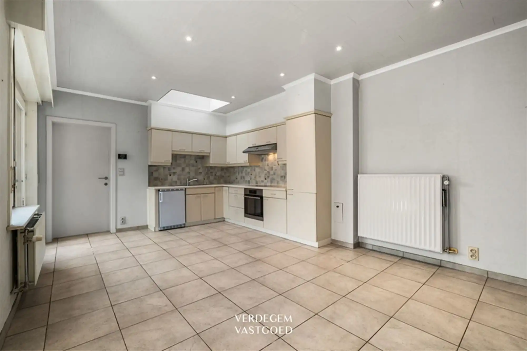 Opbrengsteigendom met 2 appartementen en 4 garages in het centrum van Sleidinge  foto 19