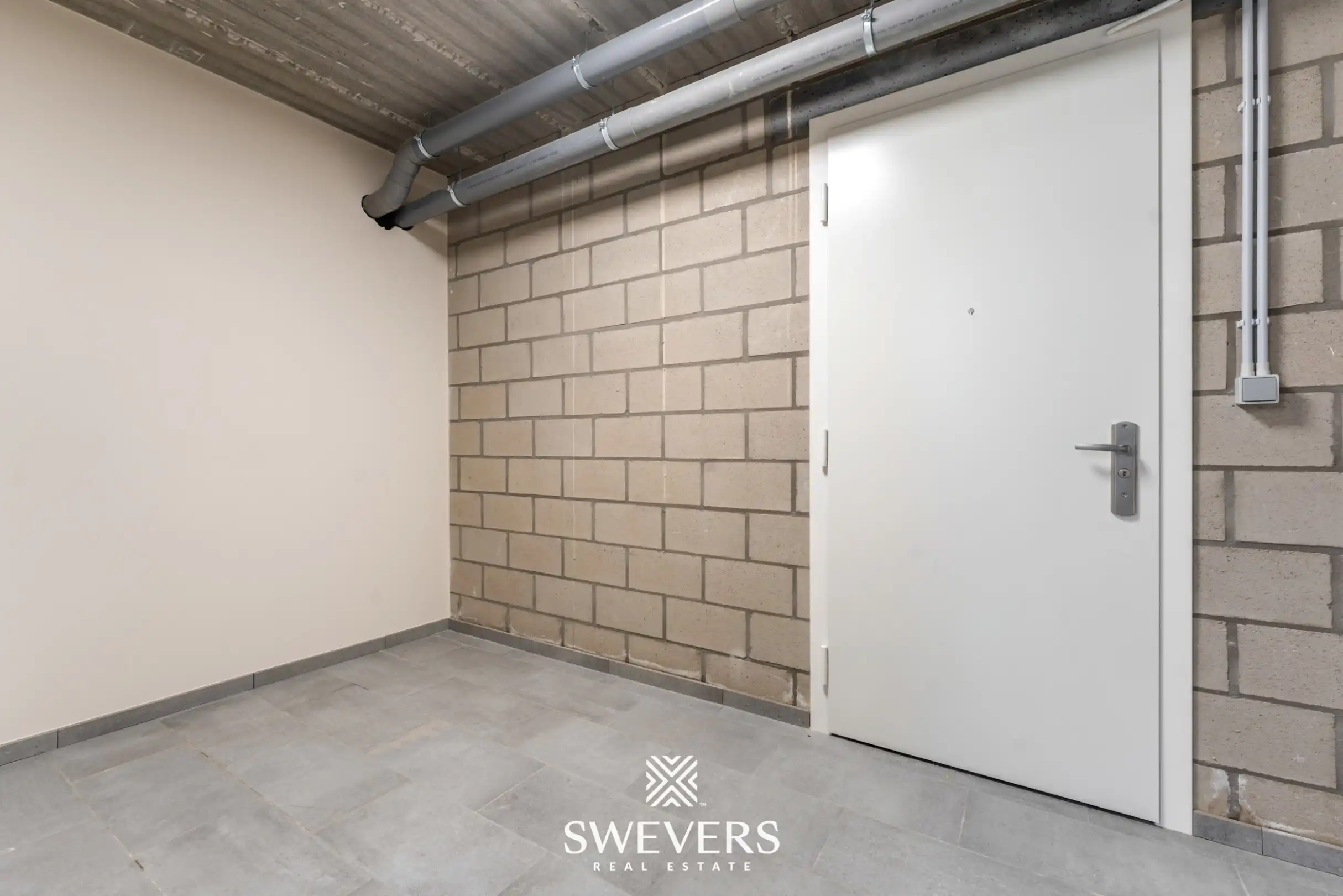 Stijlvol, gelijkvloers en instapklaar appartement (208 m²) mét private tuin en private kelder vlakbij Zolder-centrum foto 25