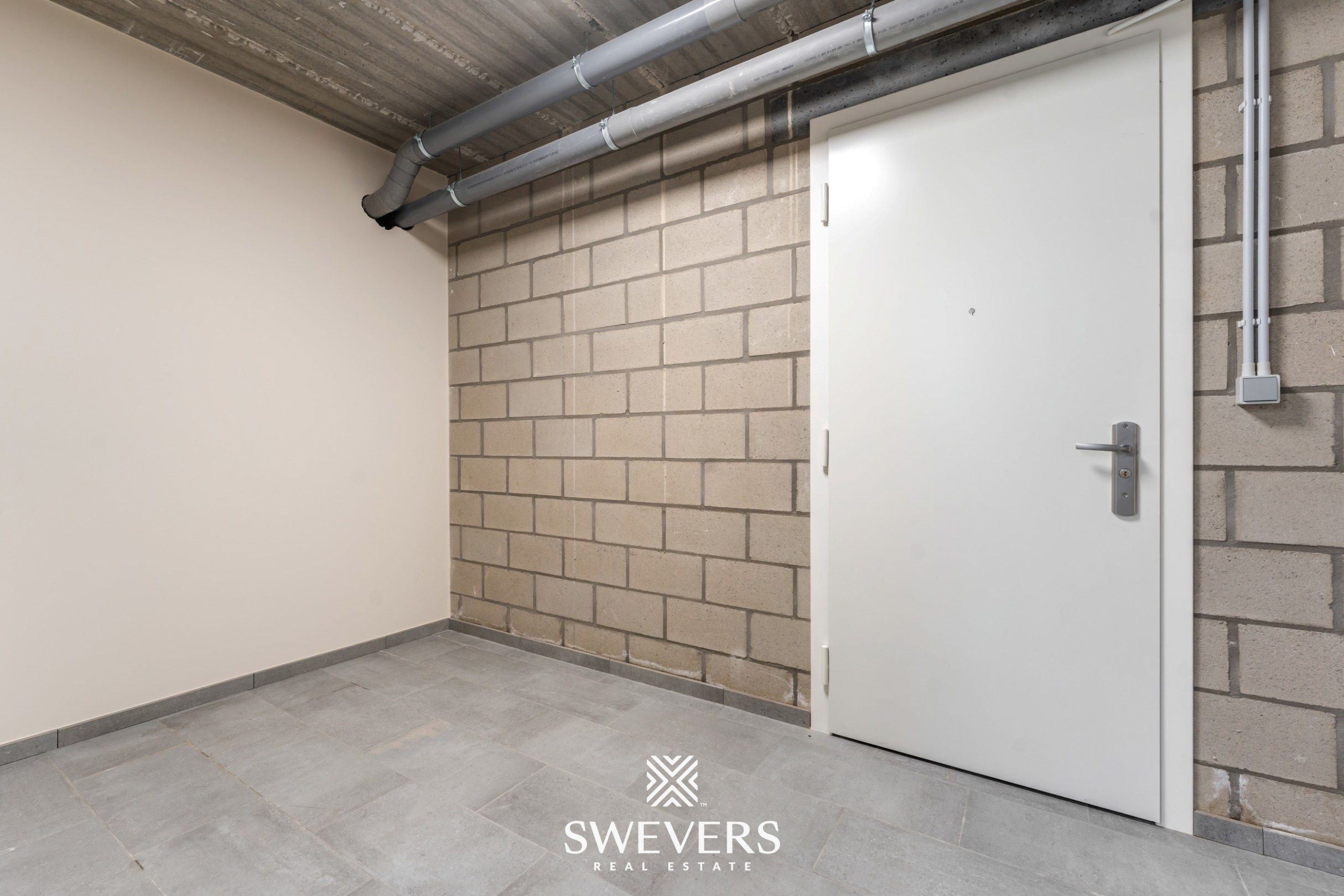 Stijlvol, gelijkvloers en instapklaar appartement (208 m²) mét private tuin en private kelder vlakbij Zolder-centrum foto 25