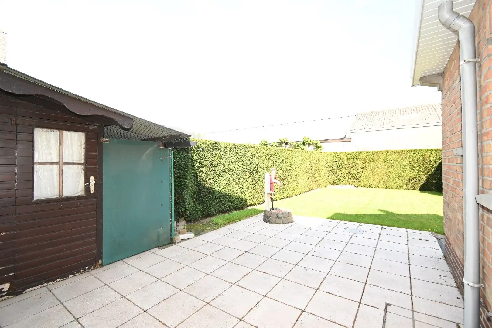 Alleenstaande woning met garage en tuin  foto 3