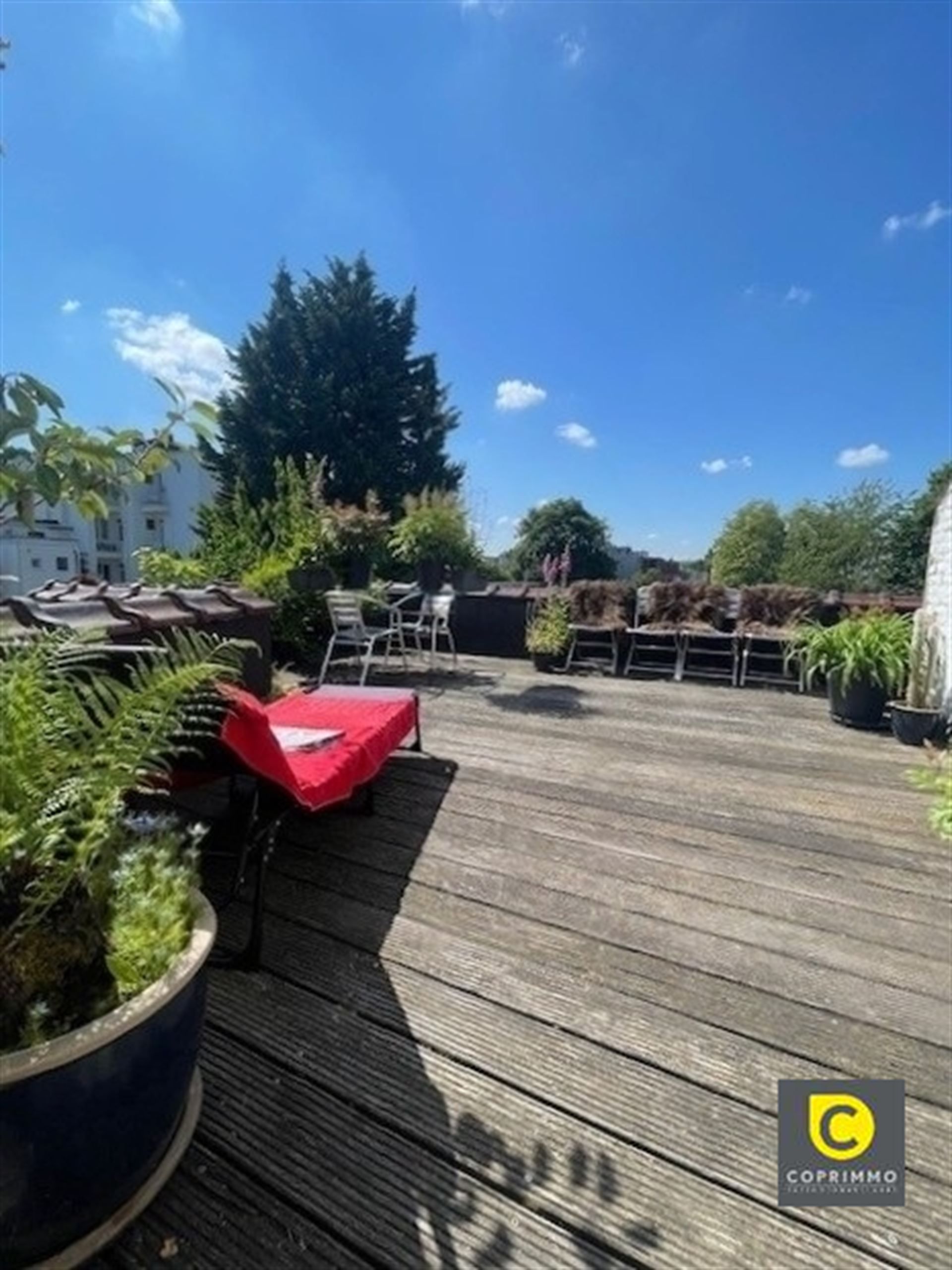 Opbrengsteigendom met 2 app en handelsruimte foto 2