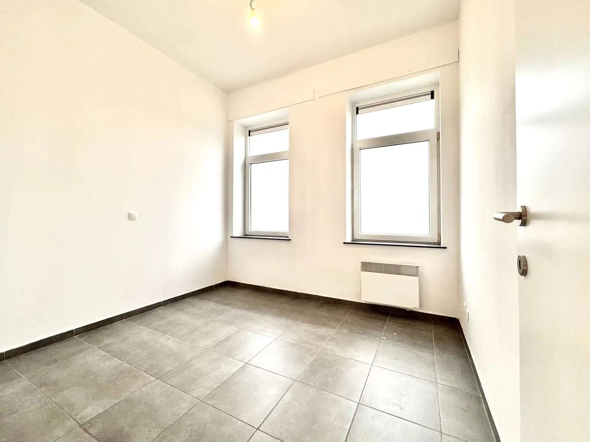 GELIJKVLOERS APPARTEMENT| 2 KAMERS | 1 PARKEERPLAATS | TERRAS foto 17