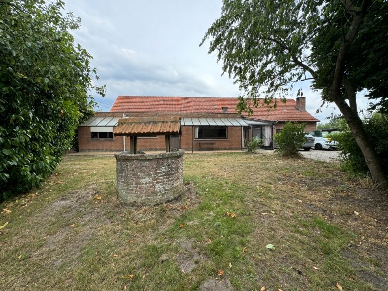 Te renoveren langgevelwoning met veel potentieel op ruim perceel in Herselt foto 4