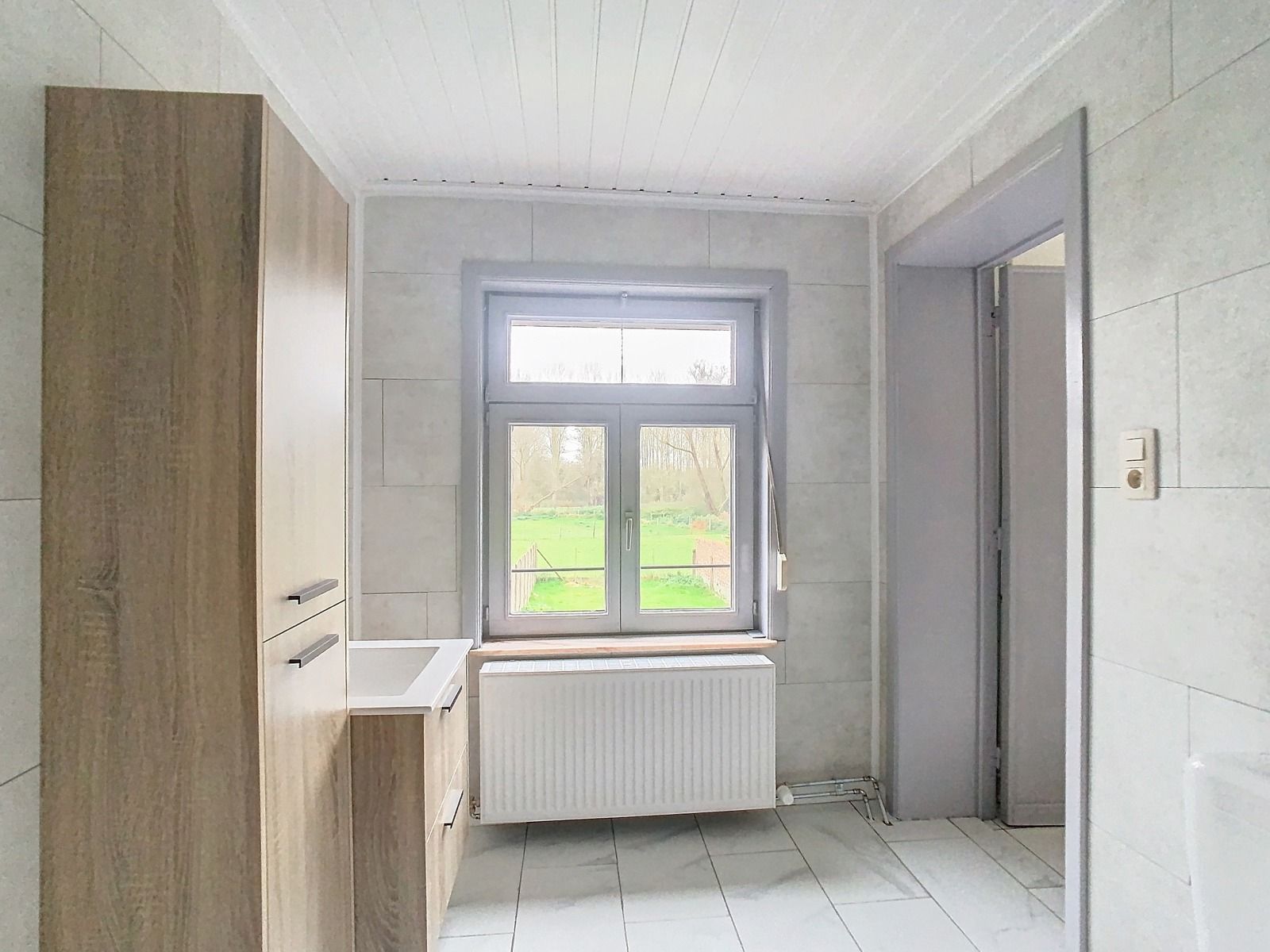 Ruime woning met 3 SLPK, tuin én garage! foto 10