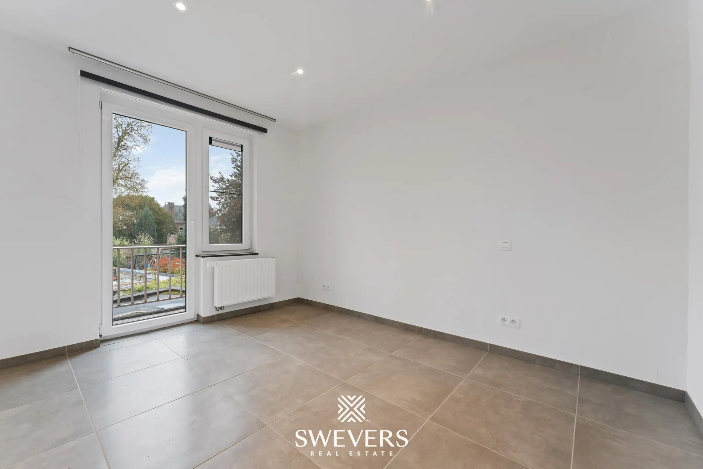 Instapklaar 2-slaapkamer appartement met autostaanplaats in hartje Tongeren   foto 11